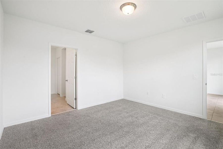 Spacious, unfurnished interior of a new home in Villamar - Classic Series, Winter Haven (Image 26).