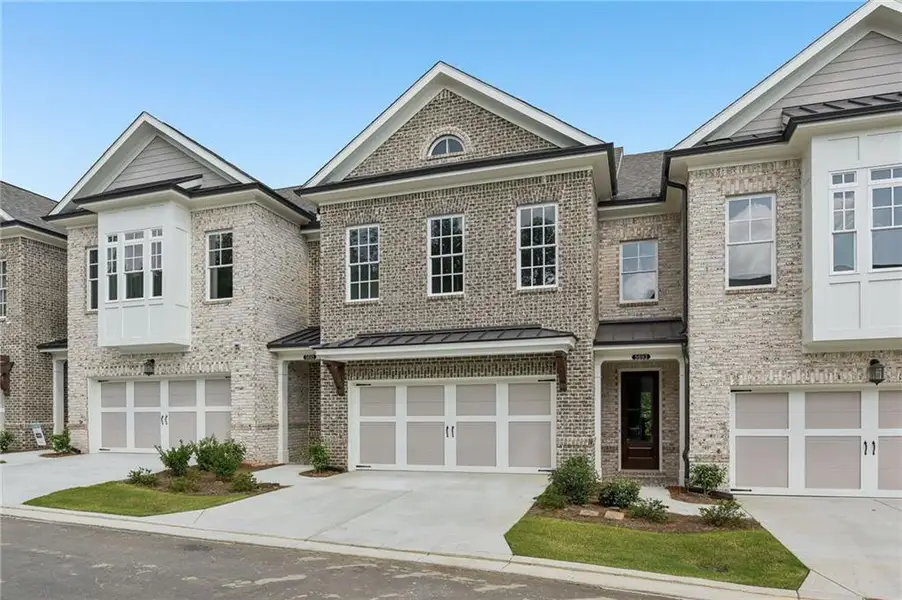 Front exterior of a new home in Waterside, Peachtree Corners, GA, highlighting curb appeal (Image 23). Front exterior of a new home in Waterside, Peachtree Corners, GA, highlighting curb appeal (Image 23).