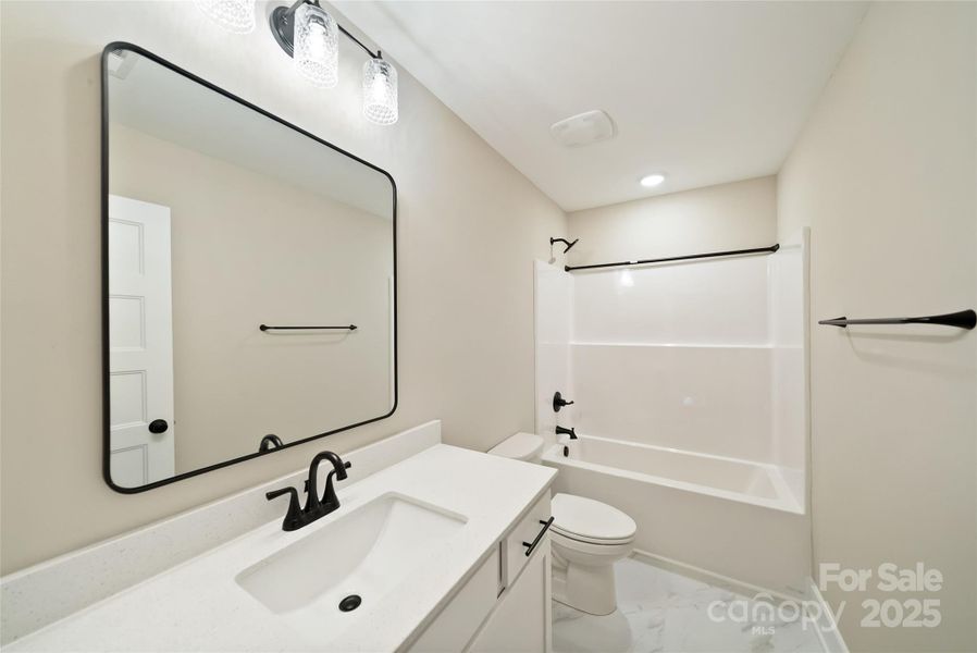 Furnished interior view inside a new home in , Monroe (Image 12).