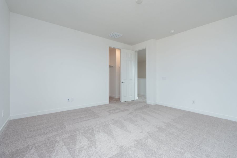 Spacious, unfurnished interior of a new home in Soleo, Queen Creek (Image 8).