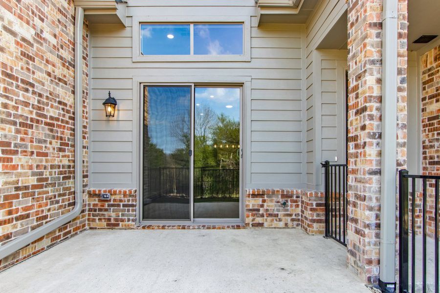 Exterior details and patio area of a home in Cottonwood Creek, Rowlett (Image 3).