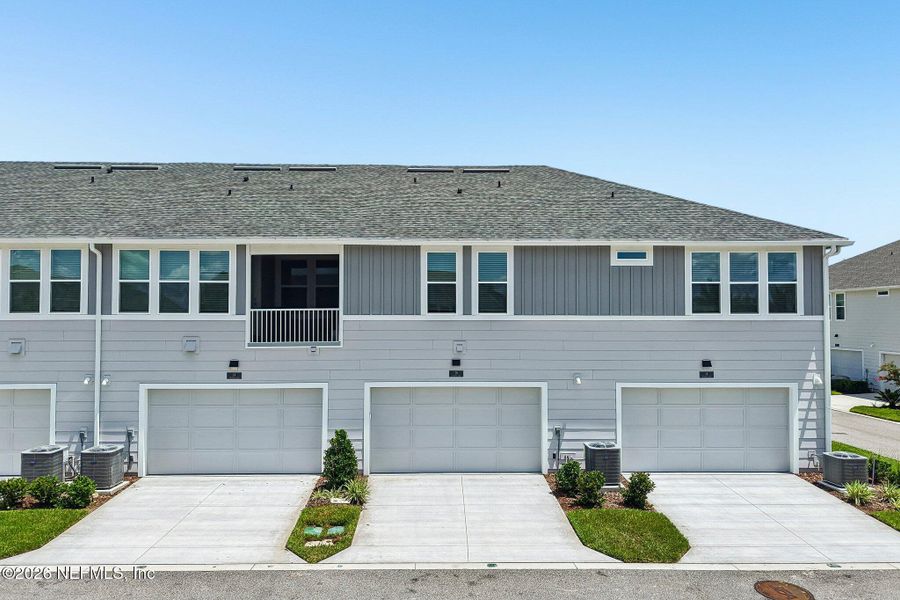Front exterior of a new home in , Ponte Vedra, FL, highlighting curb appeal (Image 27). Front exterior of a new home in , Ponte Vedra, FL, highlighting curb appeal (Image 27).