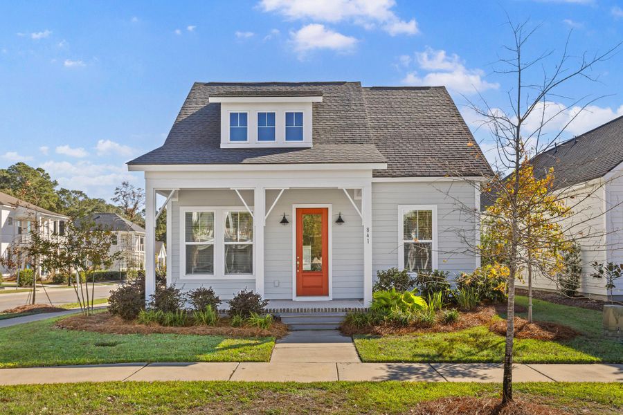 Front exterior of a new home in , Charleston, SC, highlighting curb appeal (Image 1).
