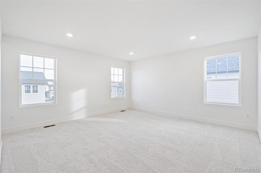 Spacious, unfurnished interior of a new home in Windsong, Thornton (Image 35).