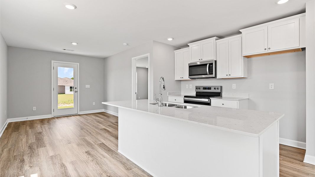 Furnished interior view inside a new home in Colonial East, Panama City Beach (Image 6).
