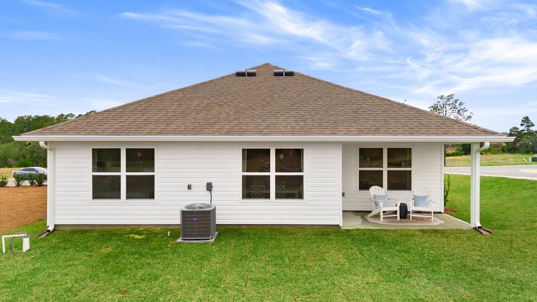 Exterior details and patio area of a home in Magnolia at the Bluffs Phase 3, Freeport (Image 3).