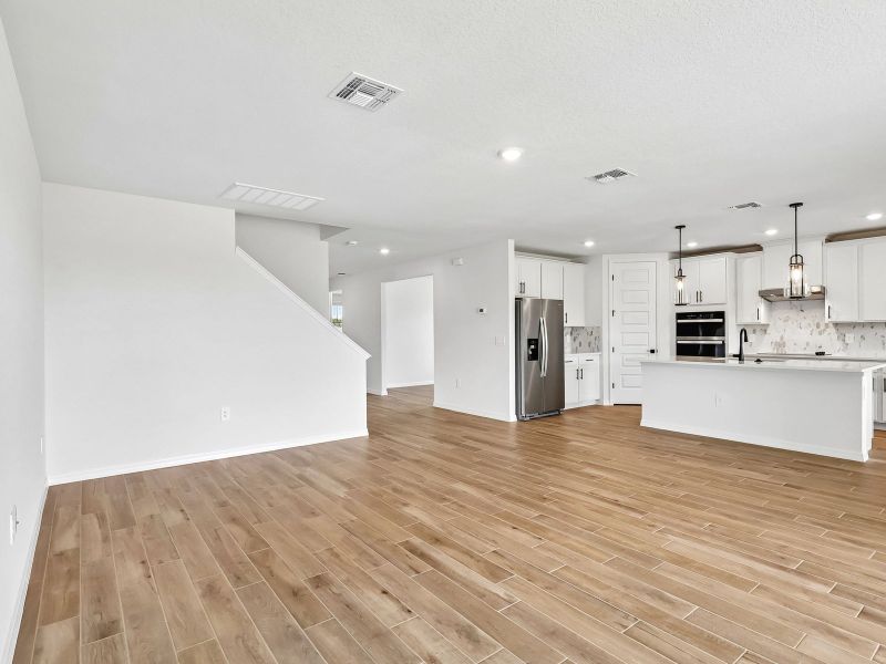 Spacious, unfurnished interior of a new home in The Grove at Stuart Crossing - Signature Series, Bartow (Image 8). Spacious, unfurnished interior of a new home in The Grove at Stuart Crossing - Signature Series, Bartow (Image 8).