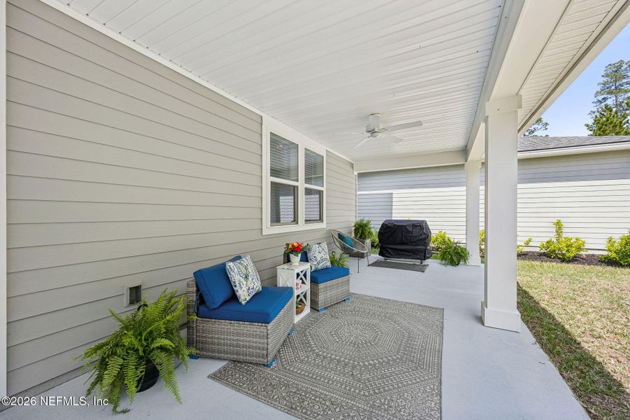 Exterior details and patio area of a home in Tributary, Yulee (Image 24).