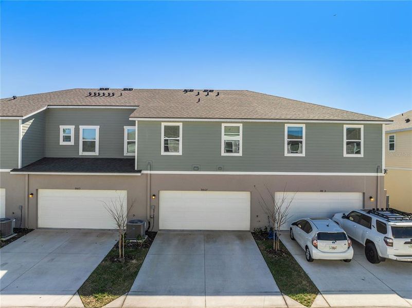 Front exterior of a new home in , Orlando, FL, highlighting curb appeal (Image 20).