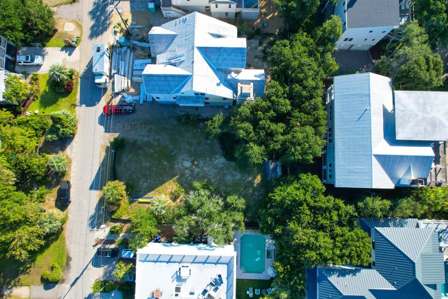 Front exterior of a new home in , Isle Of Palms, SC, highlighting curb appeal (Image 17).
