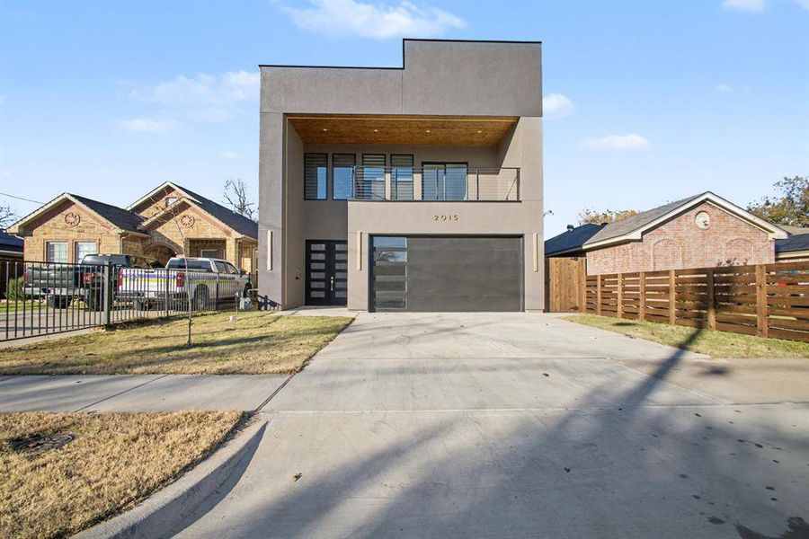 Front exterior of a new home in , Dallas, TX, highlighting curb appeal (Image 27).