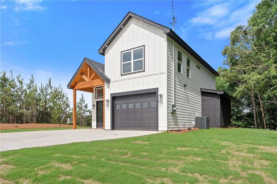 Front exterior of a new home in , Buford, GA, highlighting curb appeal (Image 19).