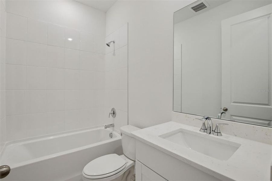 Furnished interior view inside a new home in Coasterra - Reserve Series, Palmetto (Image 15).