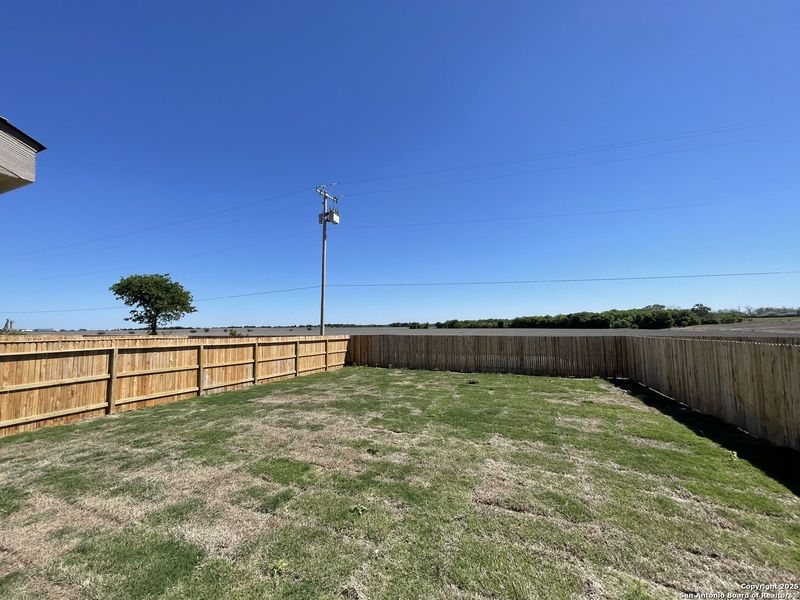 Exterior details and patio area of a home in Whisper Falls, San Antonio (Image 12).