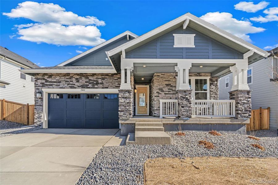 Front exterior of a new home in Windsong, Brighton, CO, highlighting curb appeal (Image 1). Front exterior of a new home in Windsong, Brighton, CO, highlighting curb appeal (Image 1).
