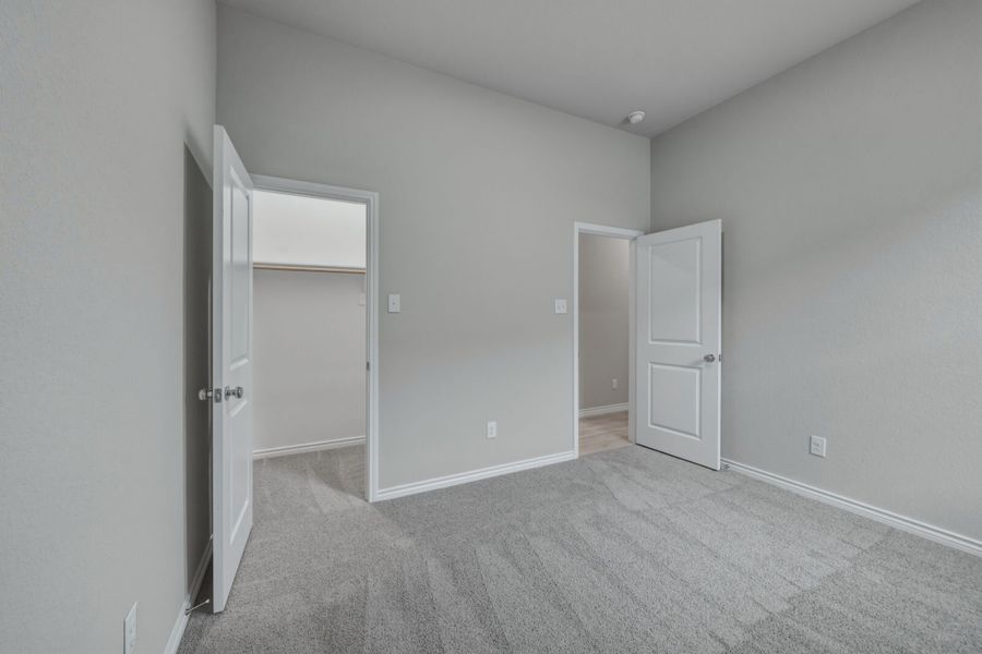 Bedroom in the Cedar home plan by Trophy Signature Homes – REPRESENTATIVE PHOTO Bedroom in the Cedar home plan by Trophy Signature Homes – REPRESENTATIVE PHOTO