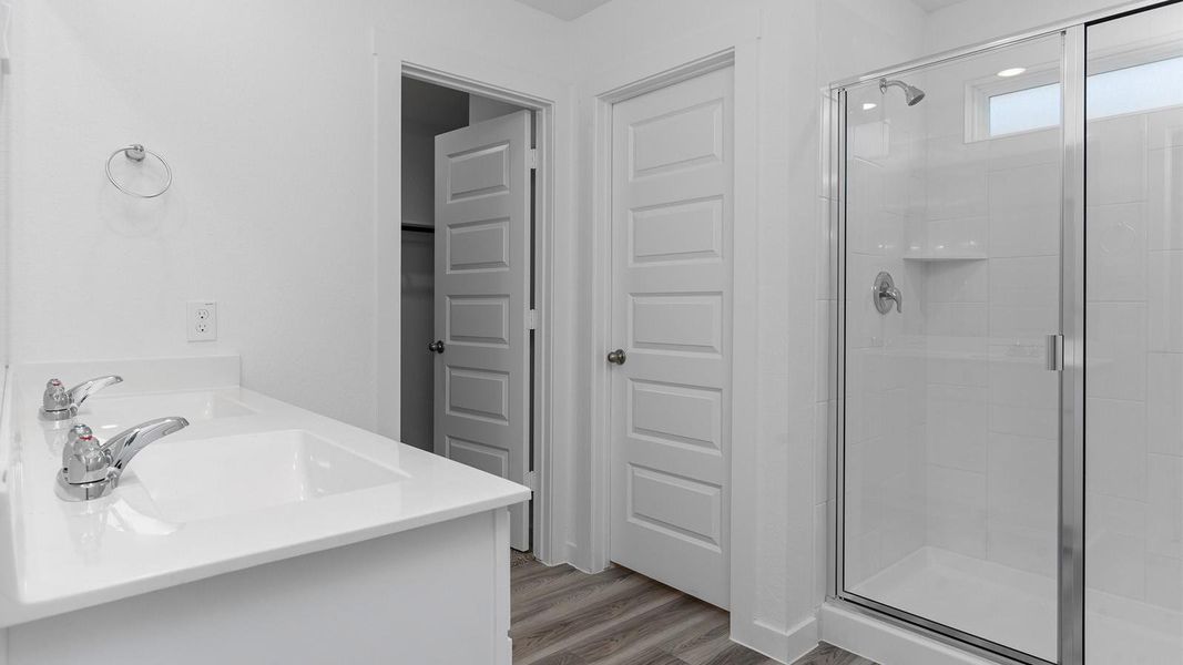 Furnished interior view inside a new home in Caldwell Crossing, Iowa Colony (Image 11). Furnished interior view inside a new home in Caldwell Crossing, Iowa Colony (Image 11).