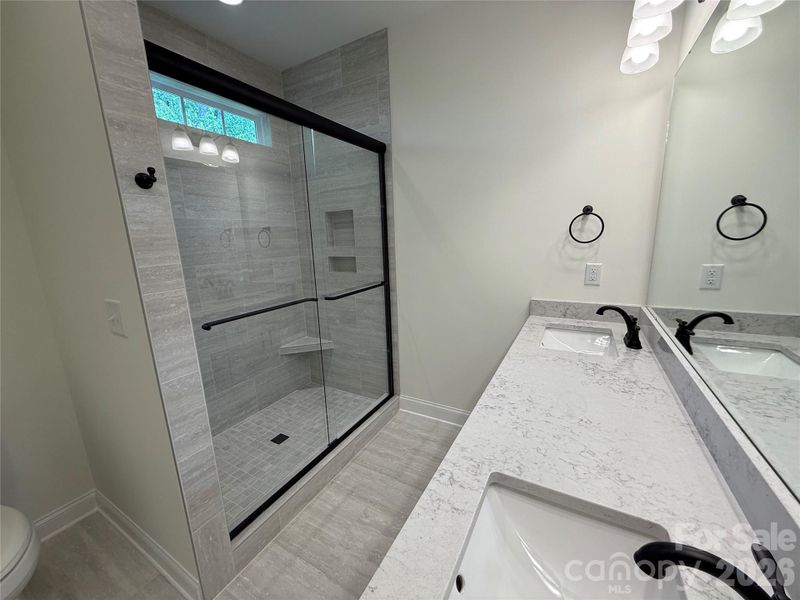 ...and large walk-in tile shower.