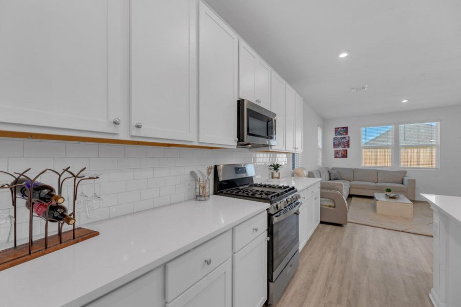 Furnished interior view inside a new home in Seasons at Carillon, Manor (Image 13).