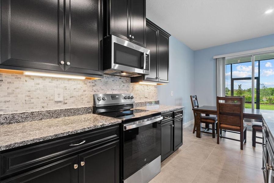 Furnished interior view inside a new home in , Port Charlotte (Image 19).