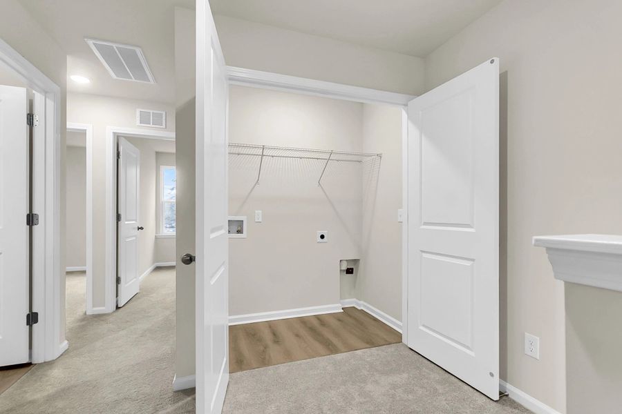 Spacious, unfurnished interior of a new home in Windward Village, Summerville (Image 11).