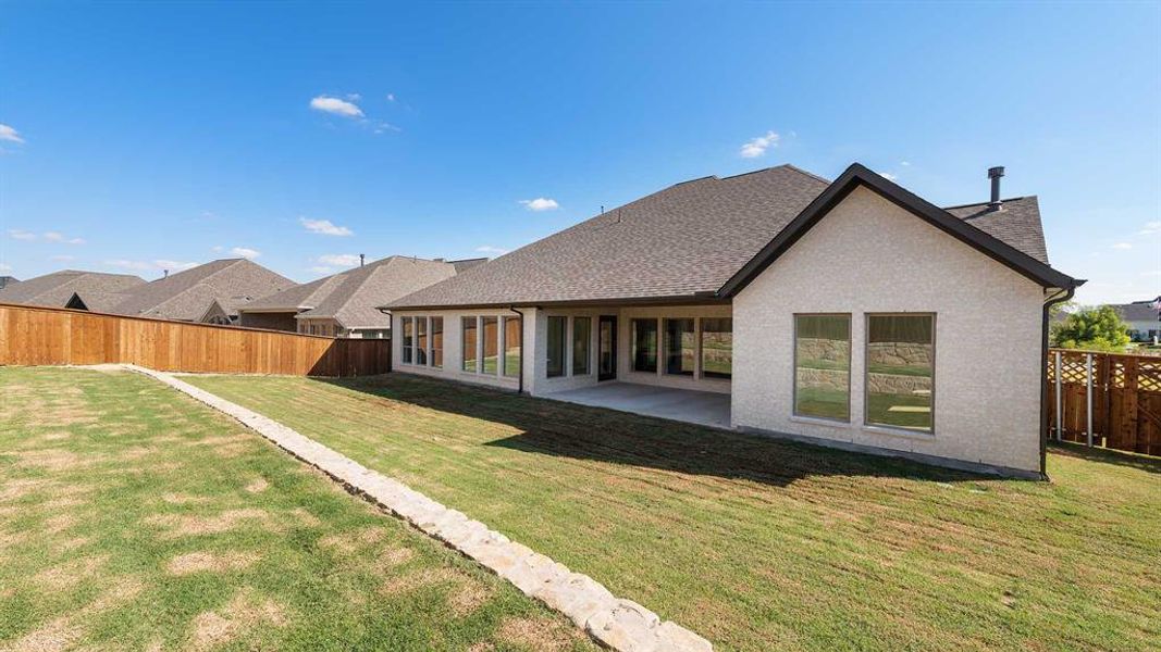 Exterior details and patio area of a home in Somerset Park 80', Rockwall (Image 2).