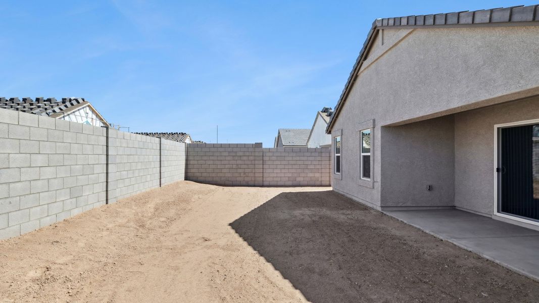 Exterior details and patio area of a home in Del Rio Ranch, Avondale (Image 17).