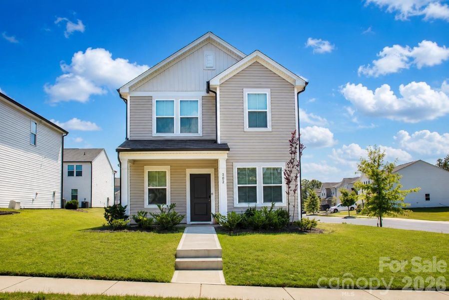 Front exterior of a new home in Autumn Park, Concord, NC, highlighting curb appeal (Image 27).