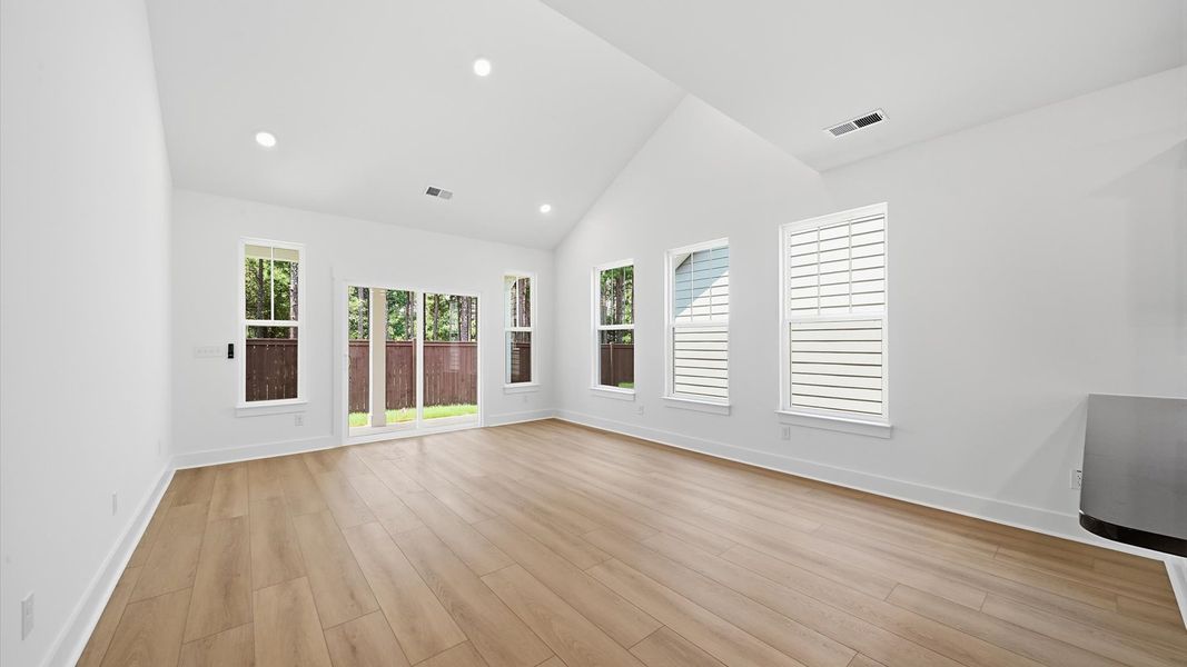 First-rate family room with eye-catching two-story ceilings and superior architectural detail First-rate family room with eye-catching two-story ceilings and superior architectural detail