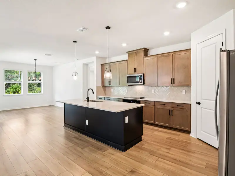 Furnished interior view inside a new home in Ridgehaven - Signature Series, Ormond Beach (Image 3).