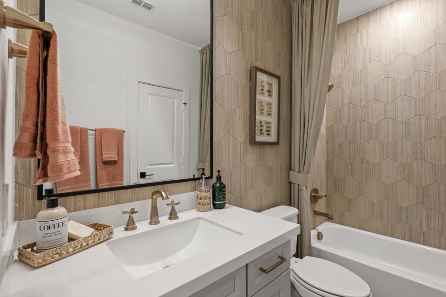 Furnished interior view inside a new home in Dunham Pointe 70', Cypress (Image 19).