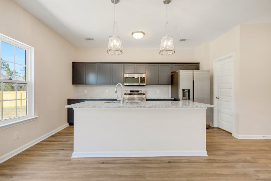 Representative furnished interior of a home built from the The Bagley by RTS Homes in Grand Reserve, Hinesville (Image 6).