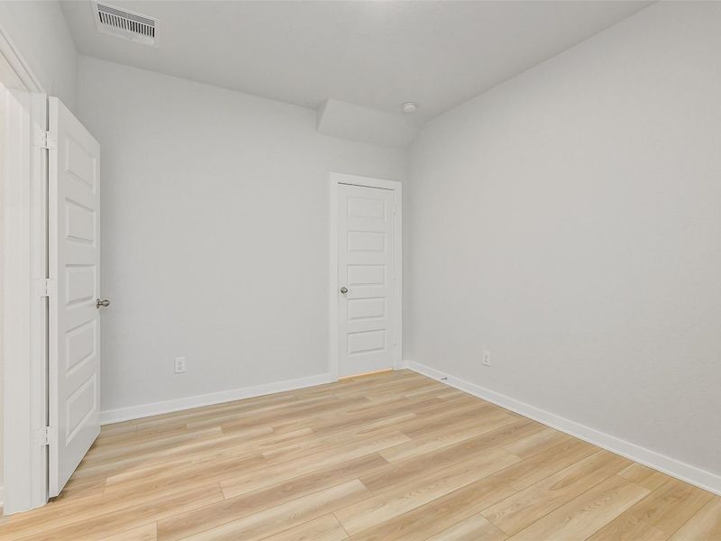 Spacious, unfurnished interior of a new home in Lakes at Black Oak, Magnolia (Image 25). Spacious, unfurnished interior of a new home in Lakes at Black Oak, Magnolia (Image 25).