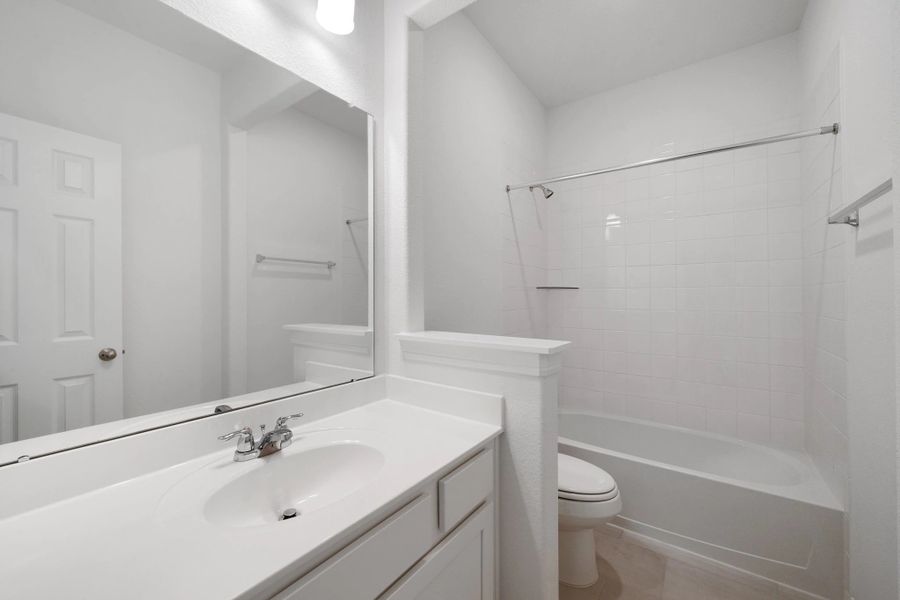 Furnished interior view inside a new home in Spring Creek Trails, Magnolia (Image 10).