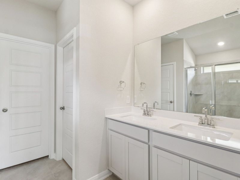 Primary suite bathroom in the Callaghan floorplan at a Meritage Homes community.