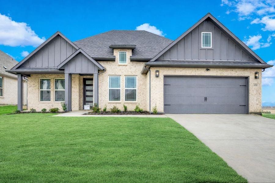 Front exterior of a new home in Westside Preserve, Midlothian, TX, highlighting curb appeal (Image 1). Front exterior of a new home in Westside Preserve, Midlothian, TX, highlighting curb appeal (Image 1).