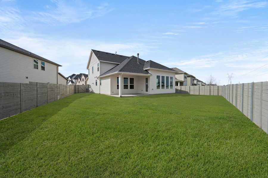 Exterior details and patio area of a home in The Retreat at Harvest, Argyle (Image 3).