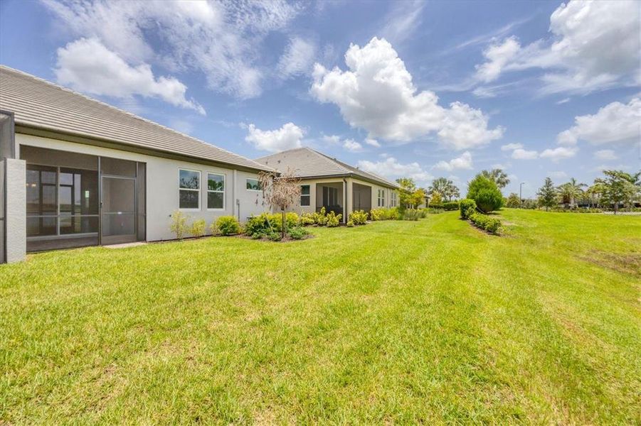 Front exterior of a new home in Sweetwater at Lakewood Ranch, Bradenton, FL, highlighting curb appeal (Image 29).