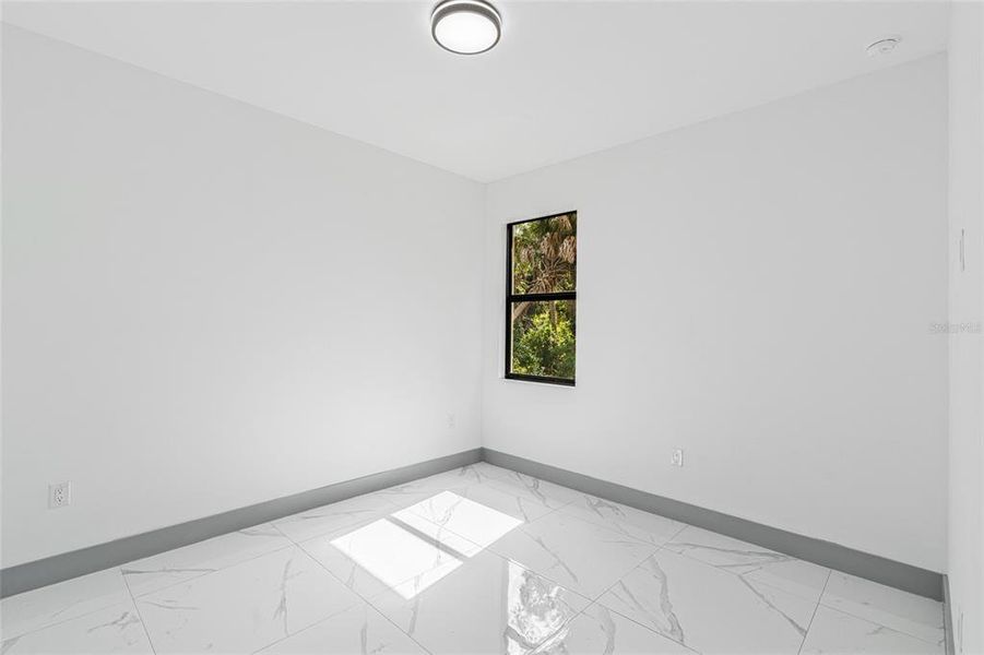 Spacious, unfurnished interior of a new home in , Port Charlotte (Image 40).