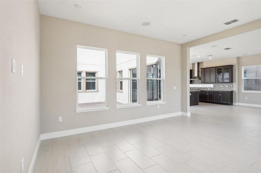 Spacious, unfurnished interior of a new home in Laureate Park, Orlando (Image 40).