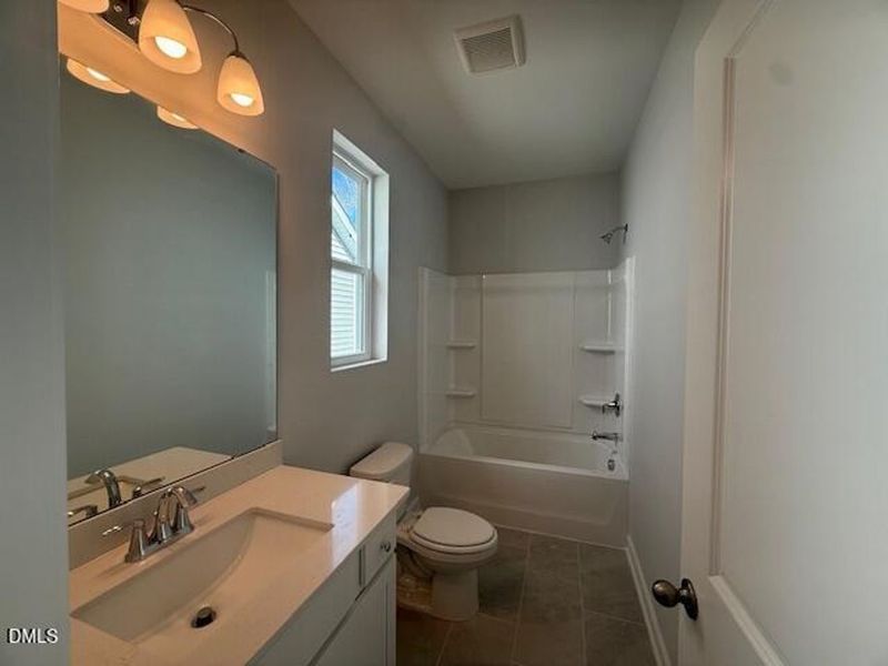Furnished interior view inside a new home in Woodland Crossing, Zebulon (Image 7).