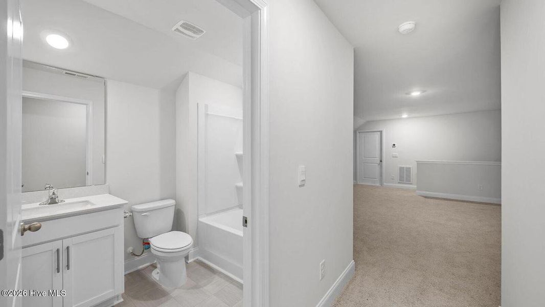 Furnished interior view inside a new home in Villa Grande, Winterville (Image 10).