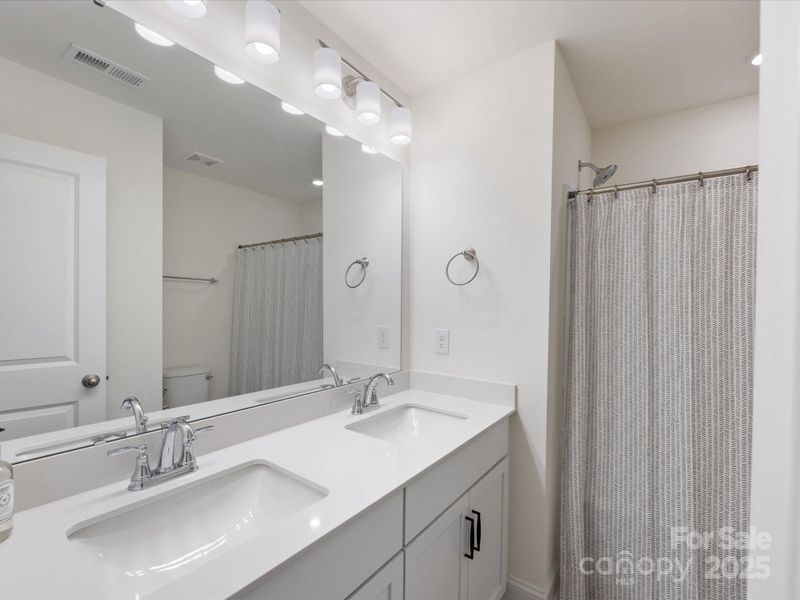 Furnished interior view inside a new home in Smith Farm, Belmont (Image 33).