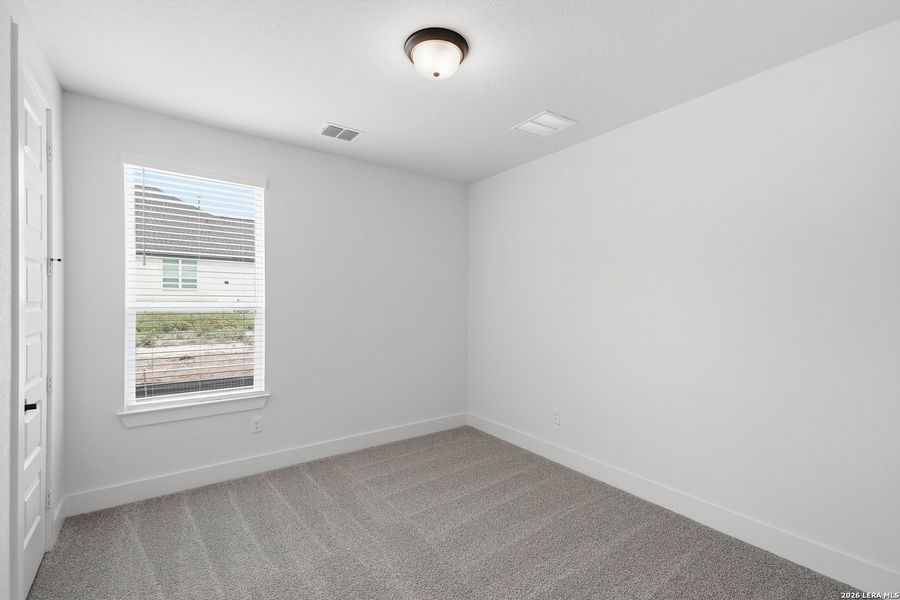 Spacious, unfurnished interior of a new home in The Reserve at Potranco Oaks, Castroville (Image 19).