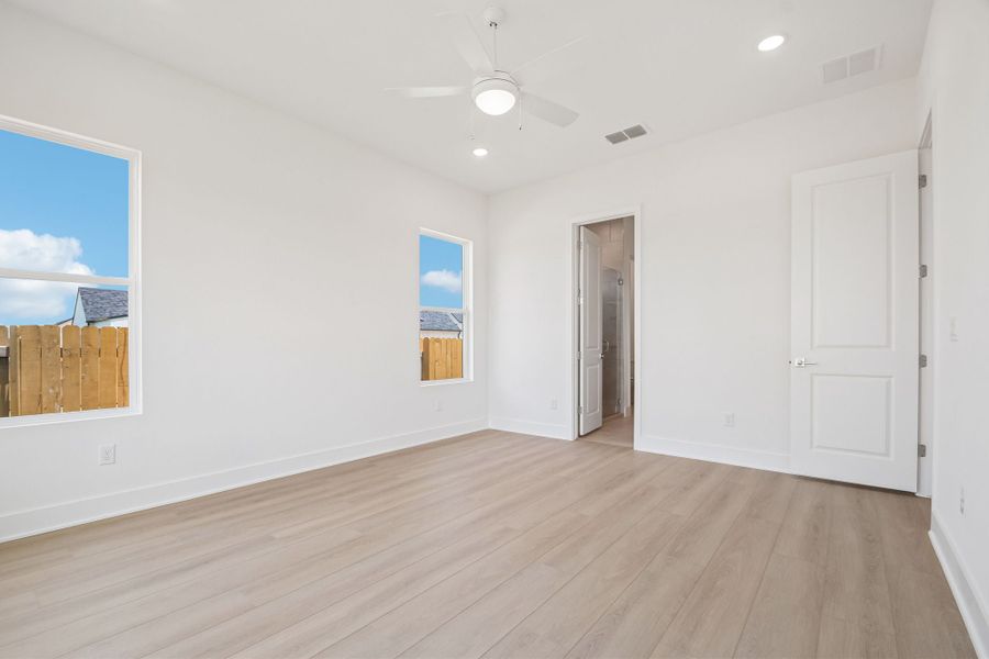 Spacious, unfurnished interior of a new home in Freedom at Anthem, Kyle (Image 18).