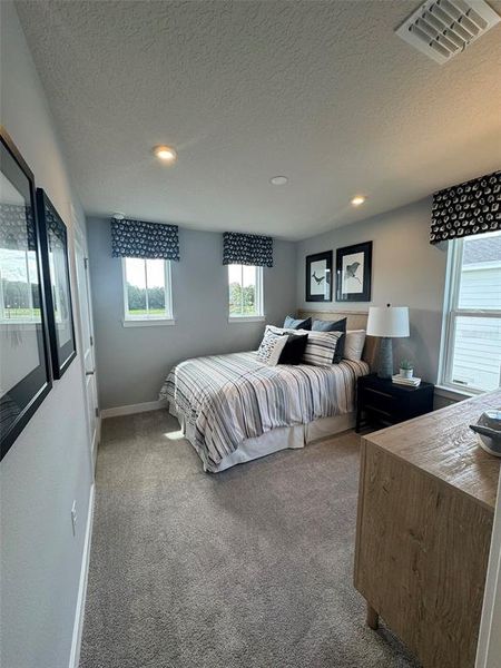 Furnished interior view inside a new home in Lake Mattie Preserve Estates, Auburndale (Image 9). Furnished interior view inside a new home in Lake Mattie Preserve Estates, Auburndale (Image 9).