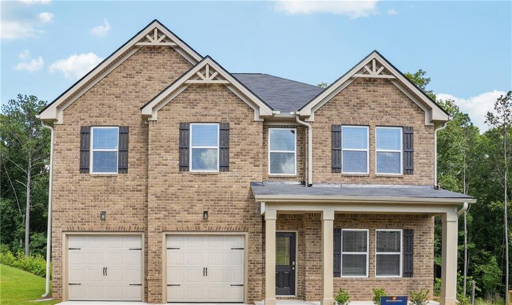 Front exterior of a new home in River Walk Farm, Covington, GA, highlighting curb appeal (Image 1). Front exterior of a new home in River Walk Farm, Covington, GA, highlighting curb appeal (Image 1).