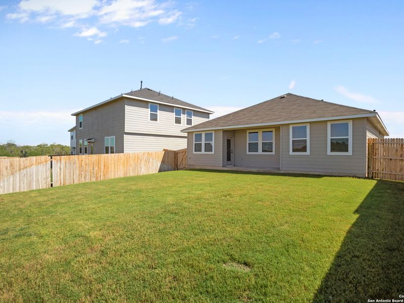 Exterior details and patio area of a home in Horizon Pointe, Converse (Image 24).