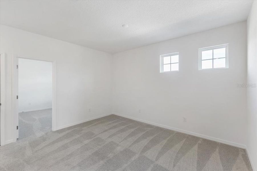 Spacious, unfurnished interior of a new home in Leela Reserve, Tavares (Image 8).