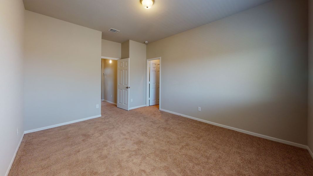 Representative unfurnished interior of a home built from the Floor Plan 3256 by Colina Homes in Grand Magnolia, Magnolia (Image 61).